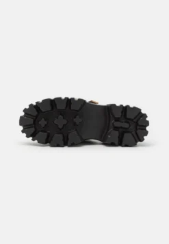 Buffalo VEGAN LION TEETH - Plateausandalette - Black -Trend Schuh Verkauf 703f596609b14c02bf93015c1df2bacd