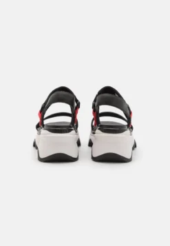 Sorel KINETIC IMPACT HEEL SLINGBACK - Plateausandalette - Black/sea Salt -Trend Schuh Verkauf de237146420a4d9ca76d13bf21710fdc